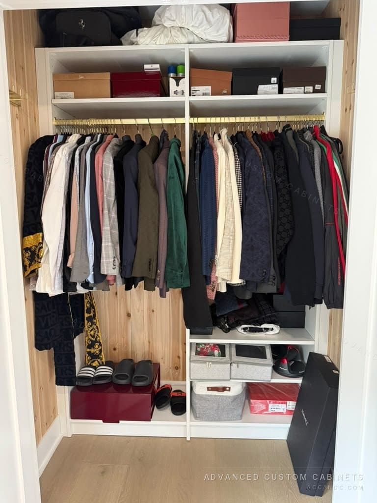 Custom walk-in wardrobe section with a brass hanging rod, cedar-lined back, upper storage, and a lower shoe shelf